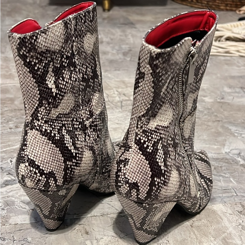 Women’s snakeskin boots 8.5